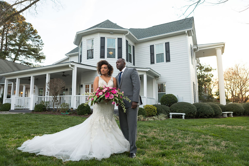 Photoshoot of Bride and Groom in front of The Matthews House