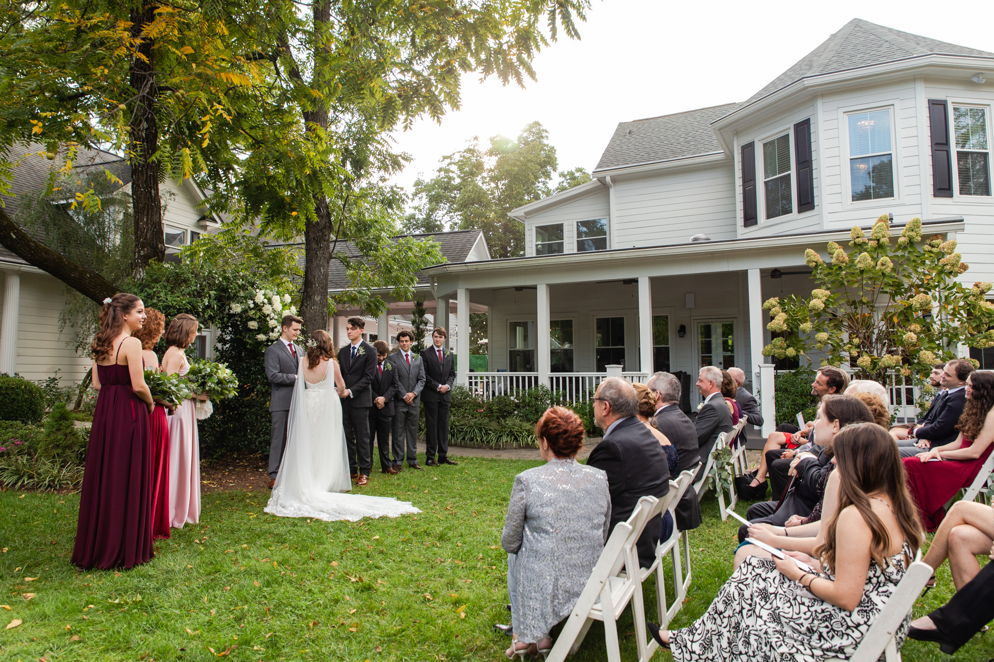 Saying I do at The Matthews House with ceremony on the green grass lawn