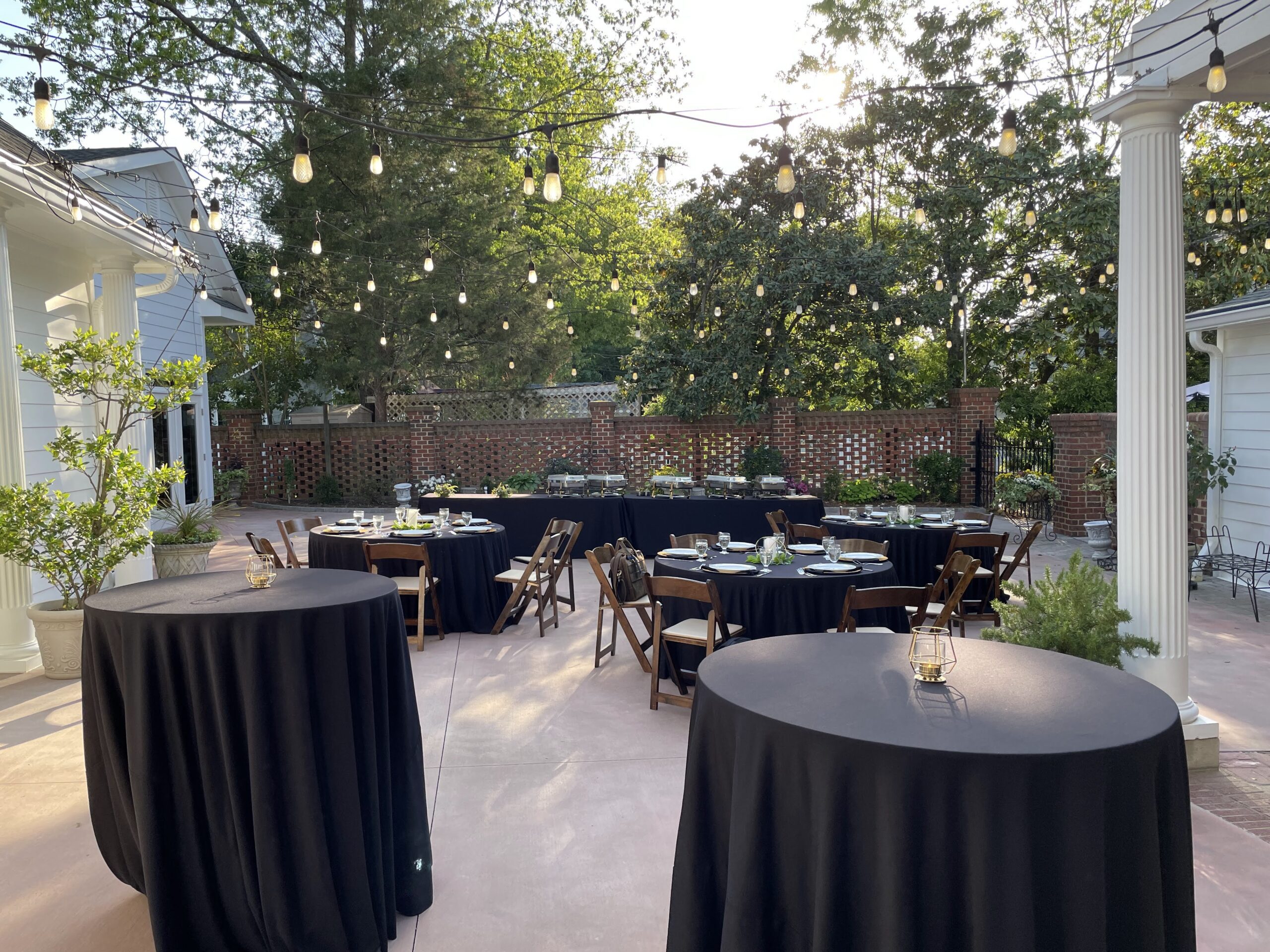 Black linen on tables outside of the venue