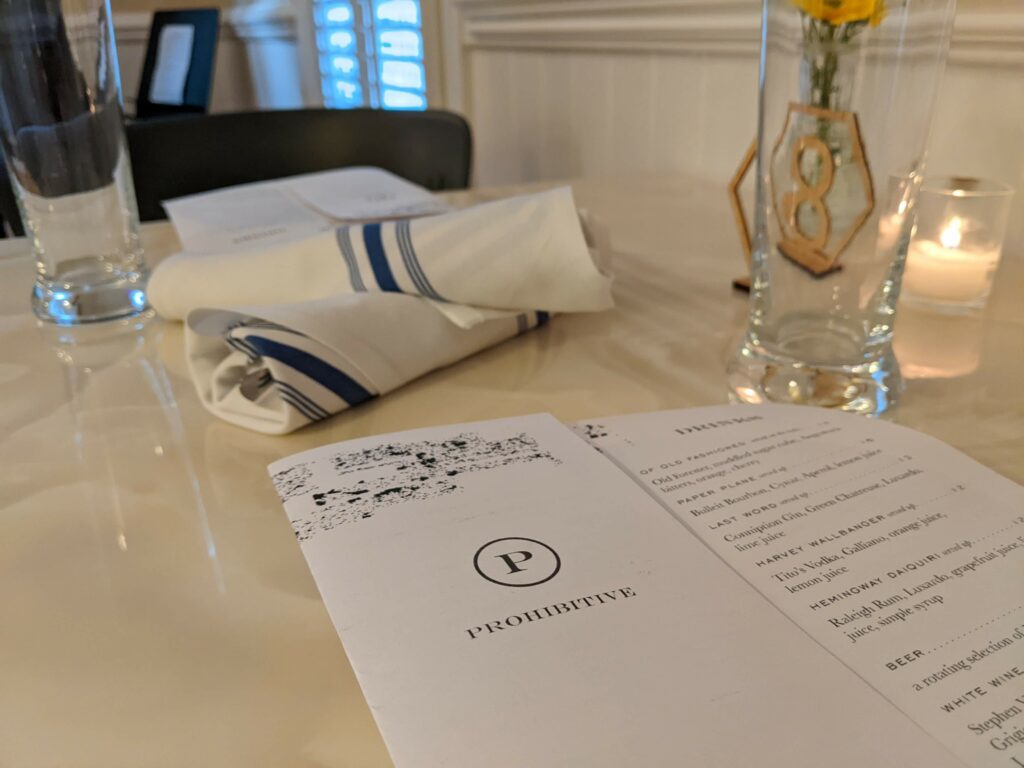 Menu on a table with glasses